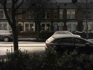 east london funny garden blog, picture of a light dusting of snow on the cars in the street out the front.